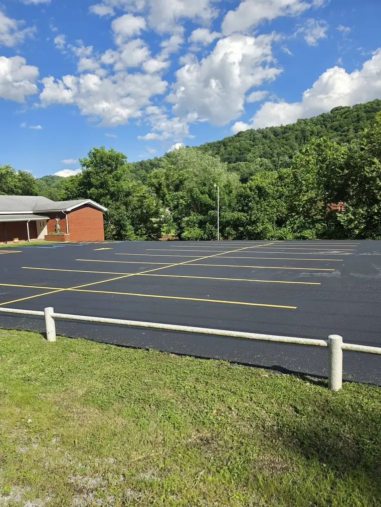 Same lot after sealcoating and striping