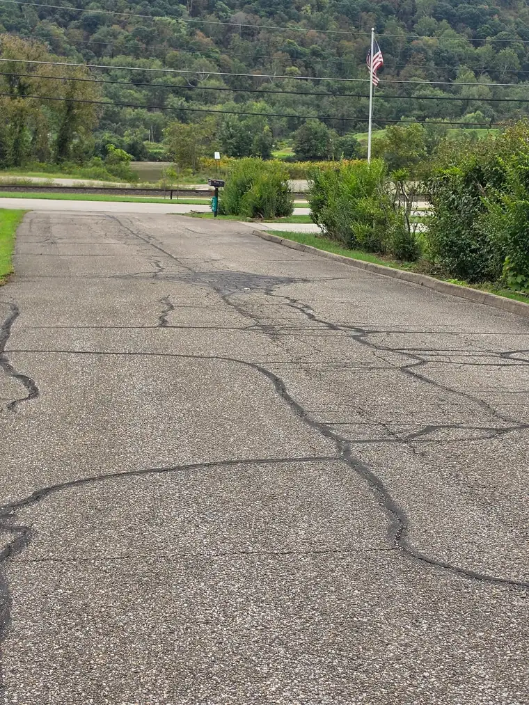 Driveway with open cracks