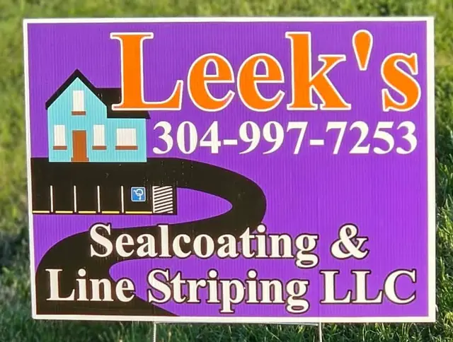 Leek's Sealcoating and Line Striping LLC purple yard sign with phone number 304-997-7253