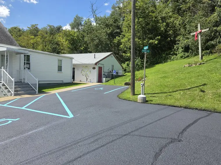 Church parking lot with blue ADA access aisle striping, Ohio Valley WV