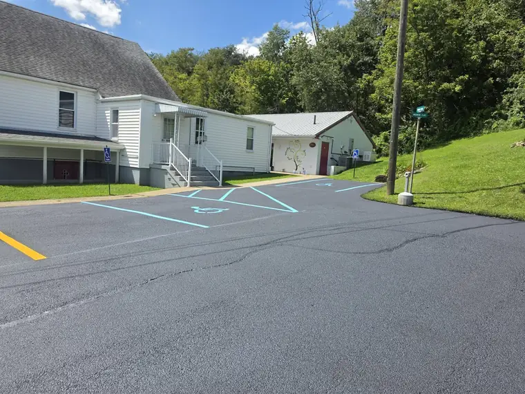Church lot with blue ADA access aisle