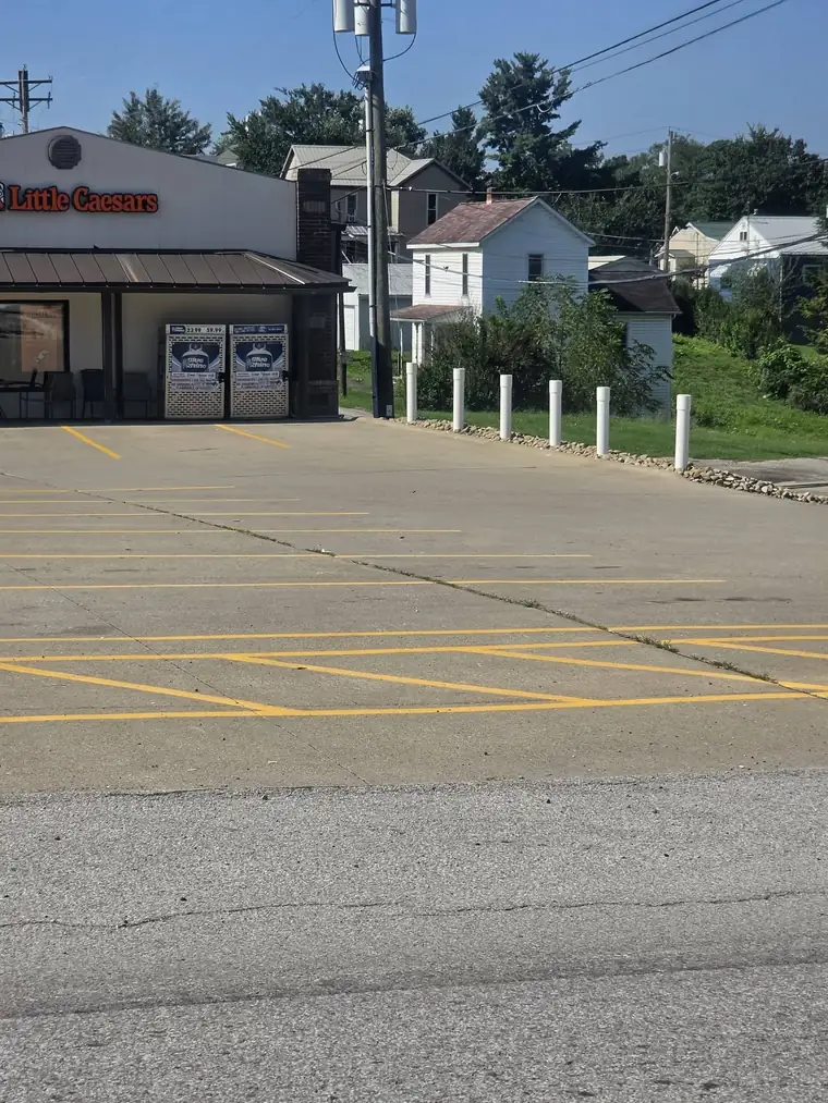 Storefront lot restriped in yellow